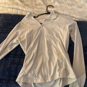 white zip up workout jacket